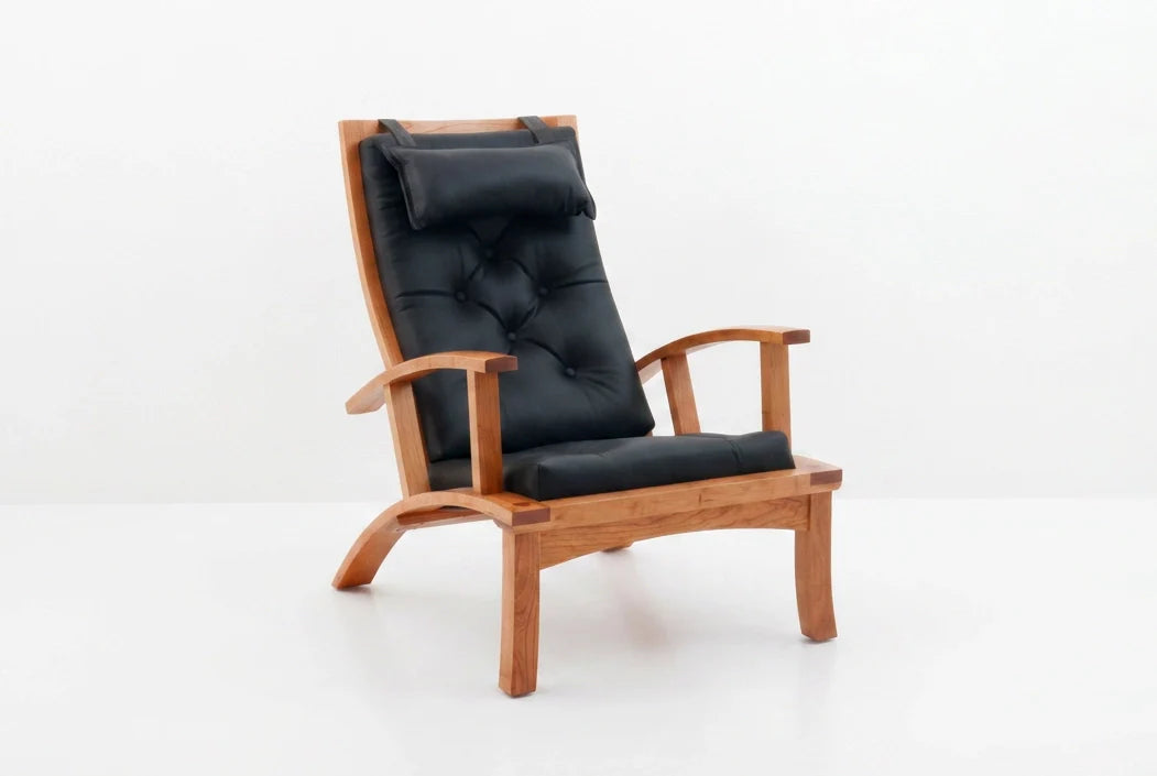 Chaise - Conçue pour épouser les courbes du corps humain et dotée d'un cuir capitonné doux comme de la soie, la bien nommée